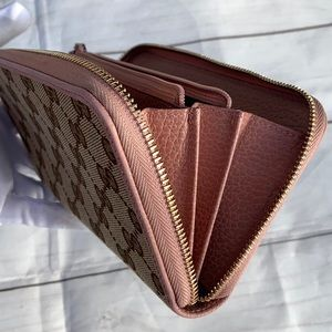 GUCCI GG Canvas Zippy Wallet - Image 9